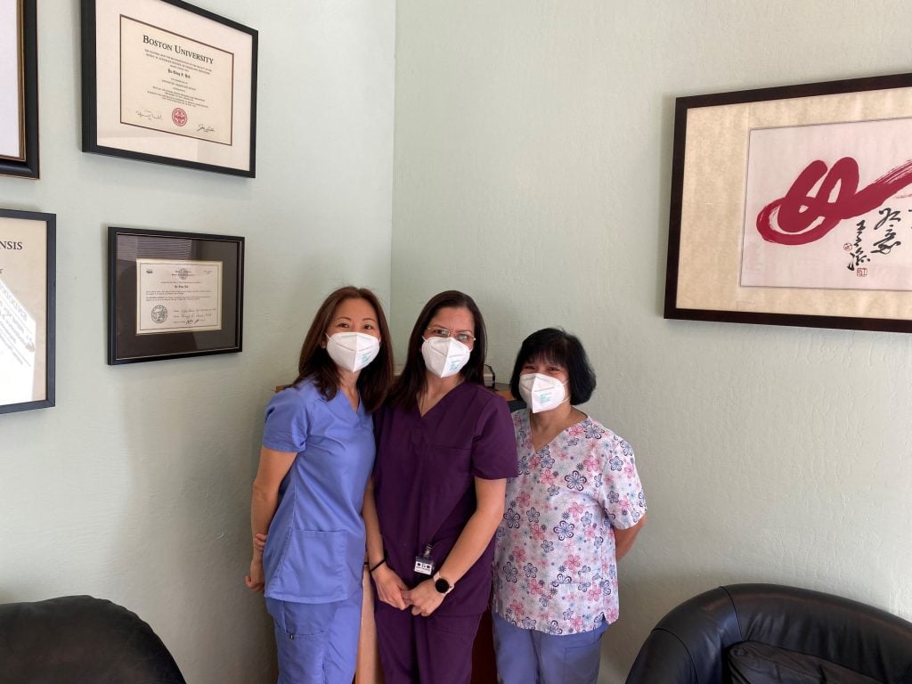 Three staff office members