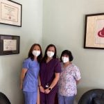 Three staff office members