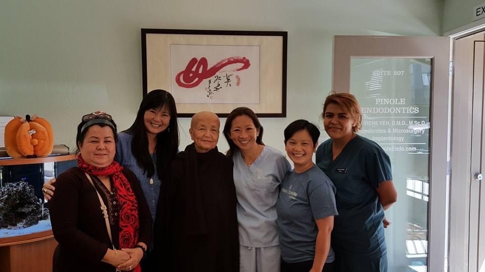 Dr. Yeh and staff members smiling
