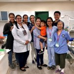 Staff members and Dr. Yeh smiling