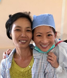 A patient smiling with Dr. Yeh after root canal procedure
