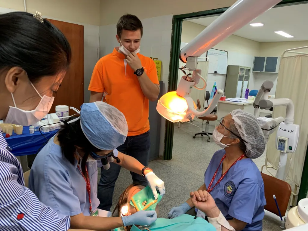 Dr. Yeh and her staff members doing charity work on a patient