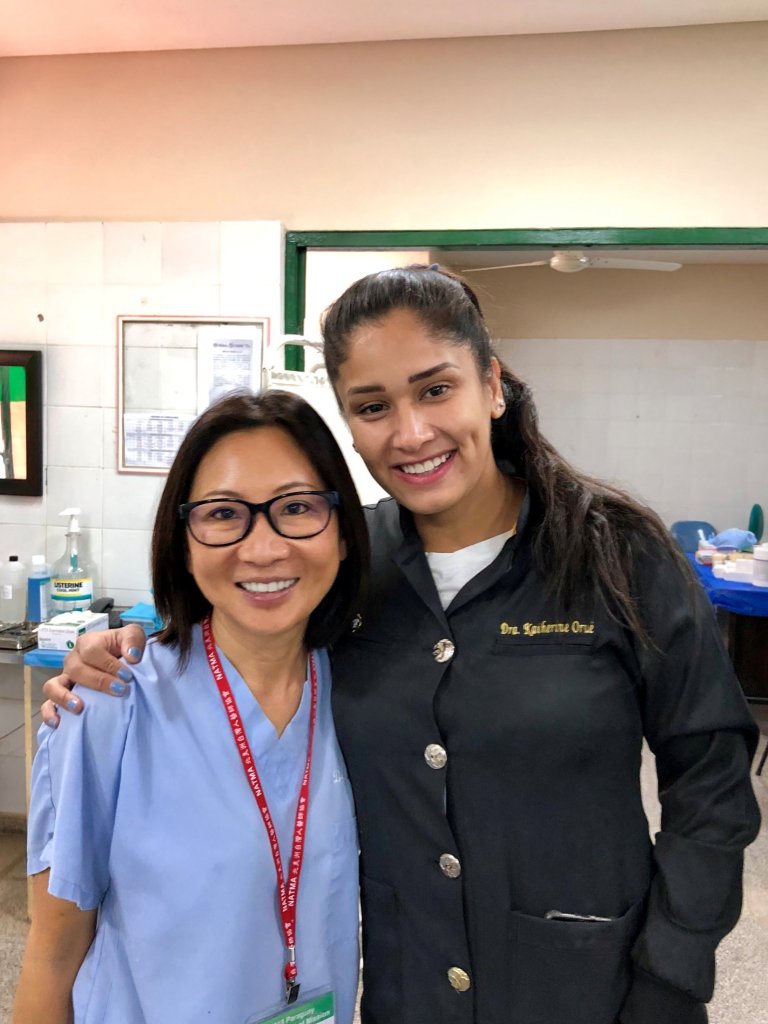Dr. Yeh and a staff member smiling